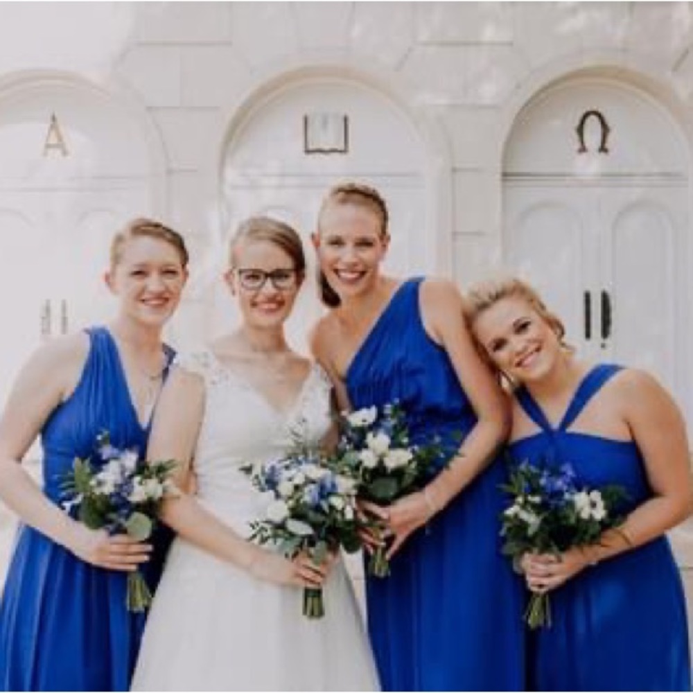 After six blue floor length cross cross gown